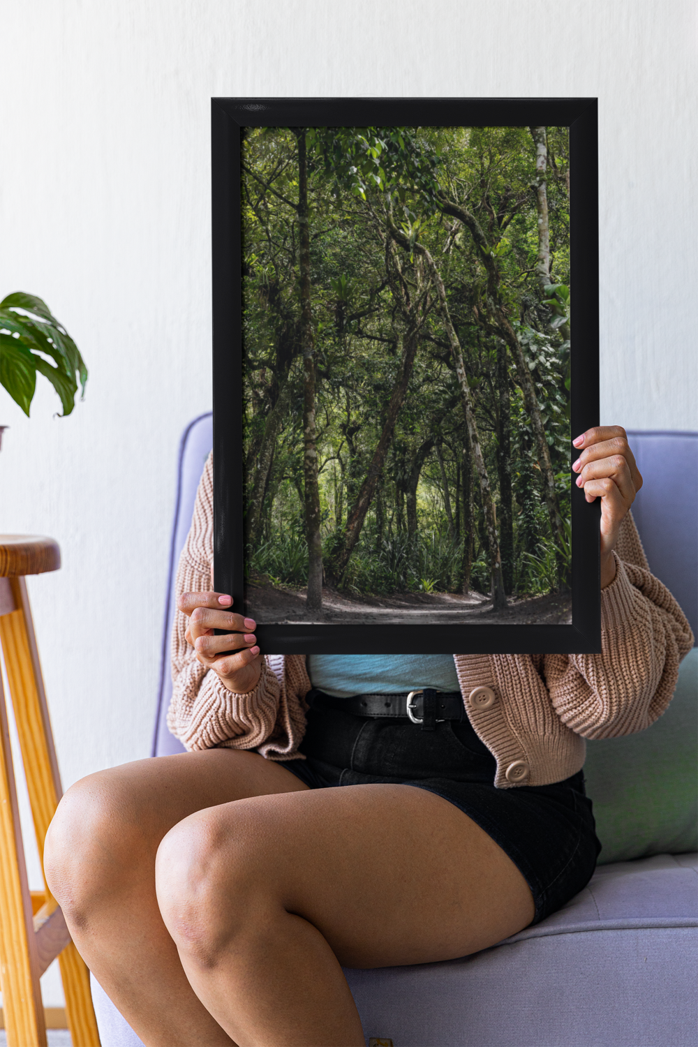 mockup-of-a-woman-with-an-art-print-sitting-on-a-couch-m31587 (3)