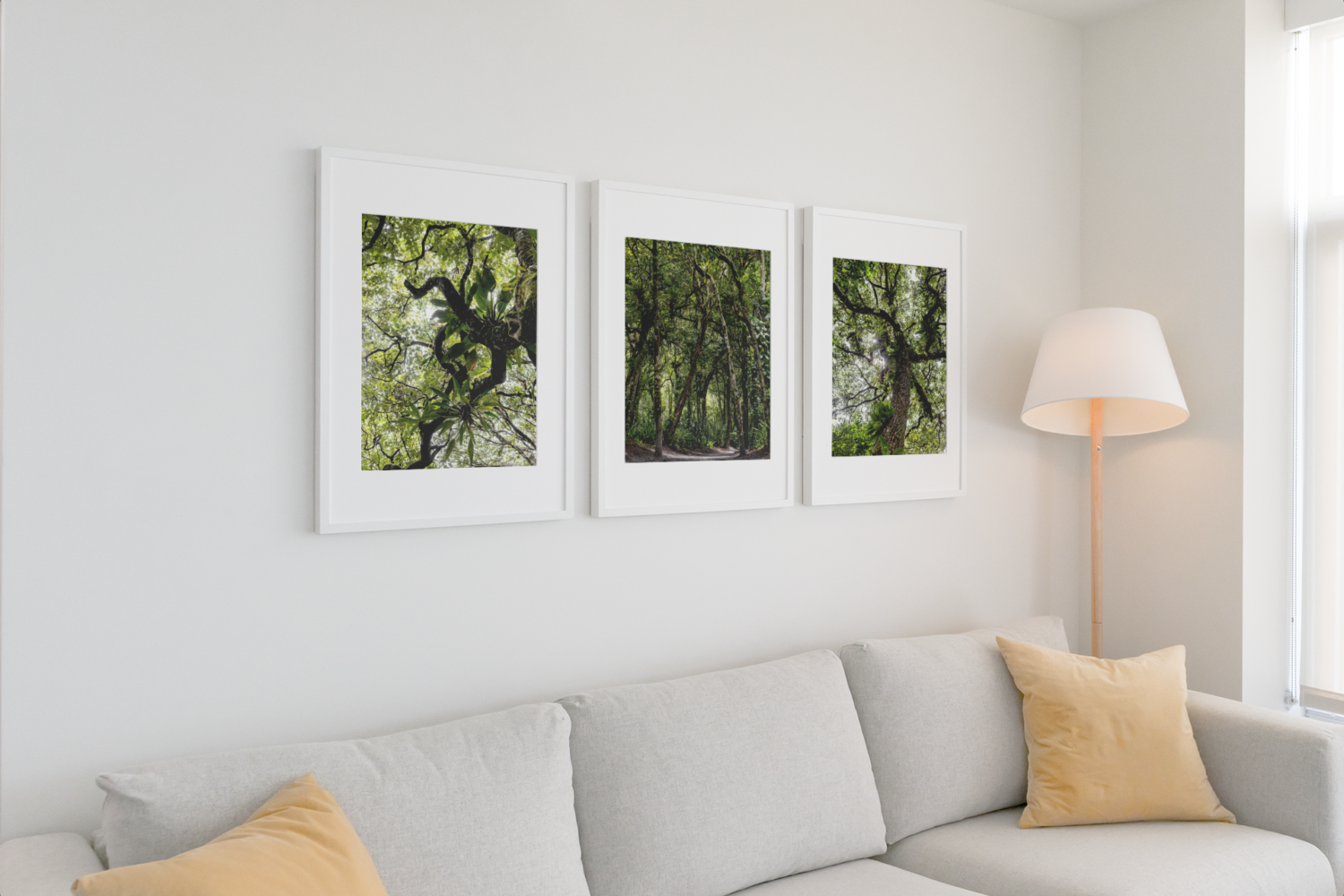 mockup-of-three-poster-frames-hanging-on-a-white-living-room-wall-548-el